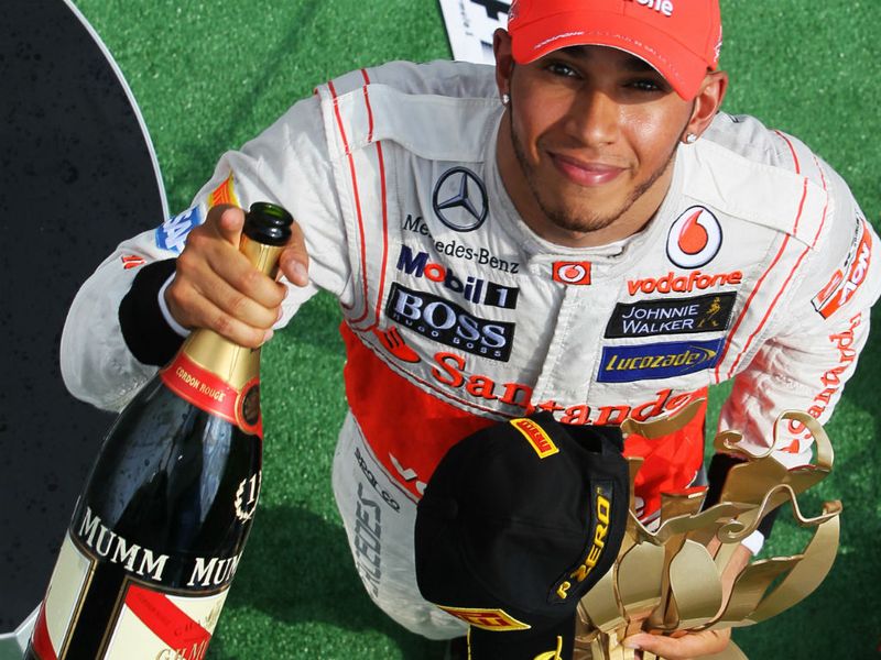 Hamilton with the trophy