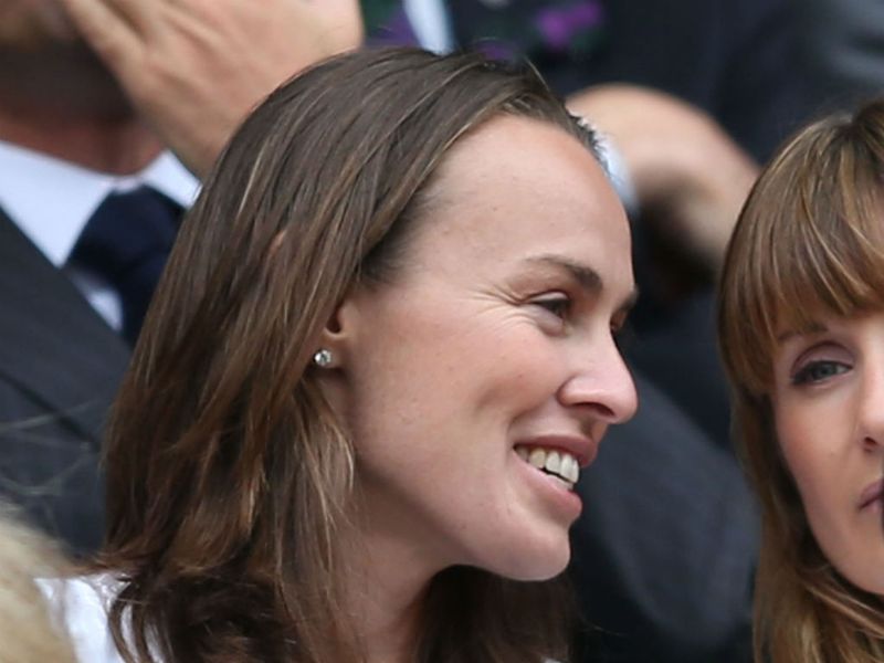 1997 Wimbledon champion Martina Hingis watches on