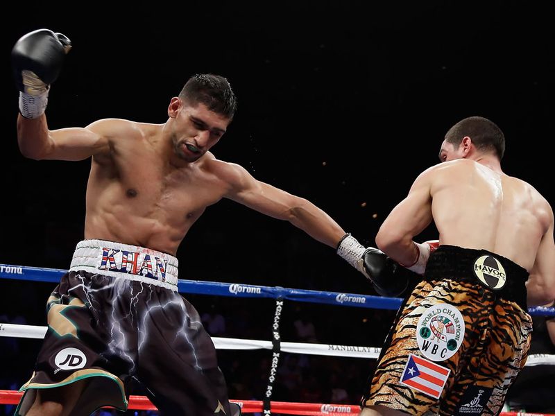 Khan is on his way to the canvas after THAT left hook