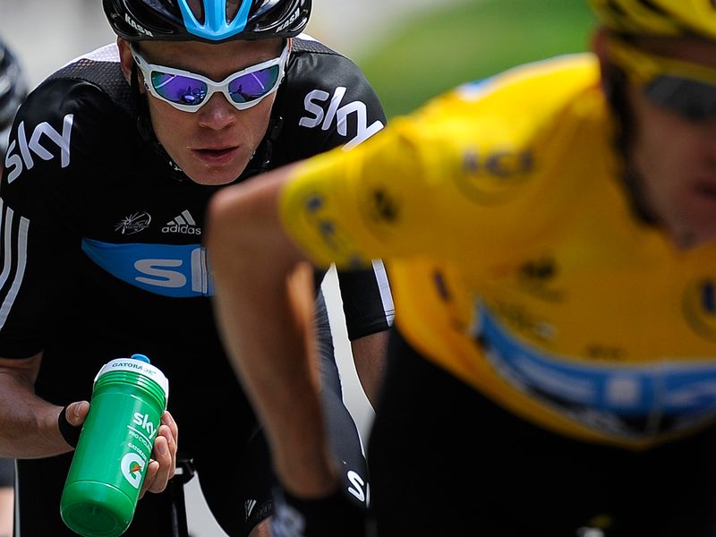 Chris Froome stays tucked in behind Team Sky team-mate Wiggins