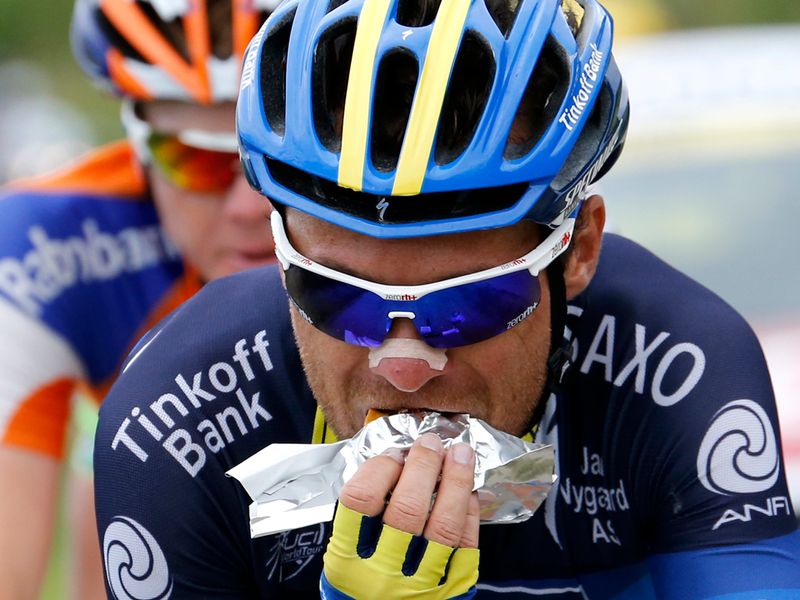 Sergio Paulinho takes some food on board in the 11-man escape group...