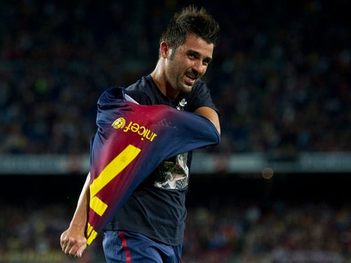 David Villa celebrates his comeback goal