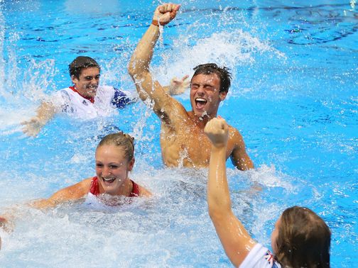 Tom Daley: Leaps into the pool to celebrate&nbsp;