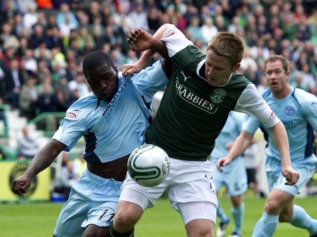 Hasselbaink and Cairney battle for possession