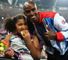 Mo Farah celebrates with his daughter