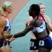 Lee McConnell, Christine Ohuruoguand and Eilidh Child celebrate a third place finish in the second heat, as they progress to Saturday's final