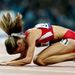 Morgan Uceny beats the ground in frustration after she trips in the Women's 1500m final