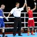 Joy and despair: Zou Shiming of China is declared the winner over Ireland's Paddy Barnes during their light fly (49kg) boxing semi-final.
