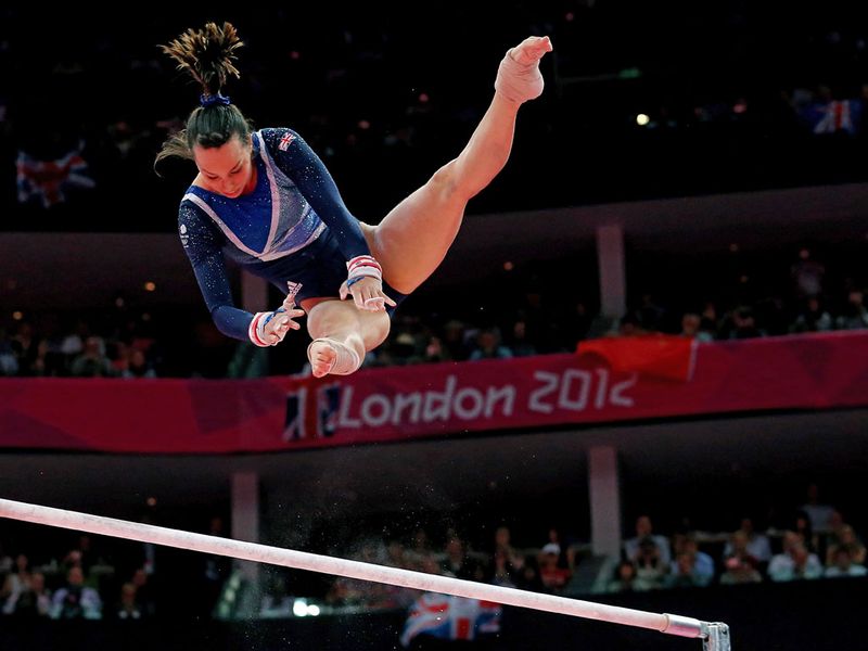 Beth Tweddle, Britain's most successful gymnast, signed off in style after winning bronze in the women's uneven bars with a time of 15.916