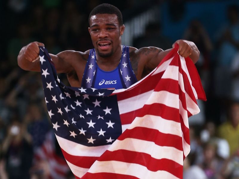 Jordan Burroughs claimed the first wrestling gold of the Games for the United States - and a check for a 250,000 US dollars.