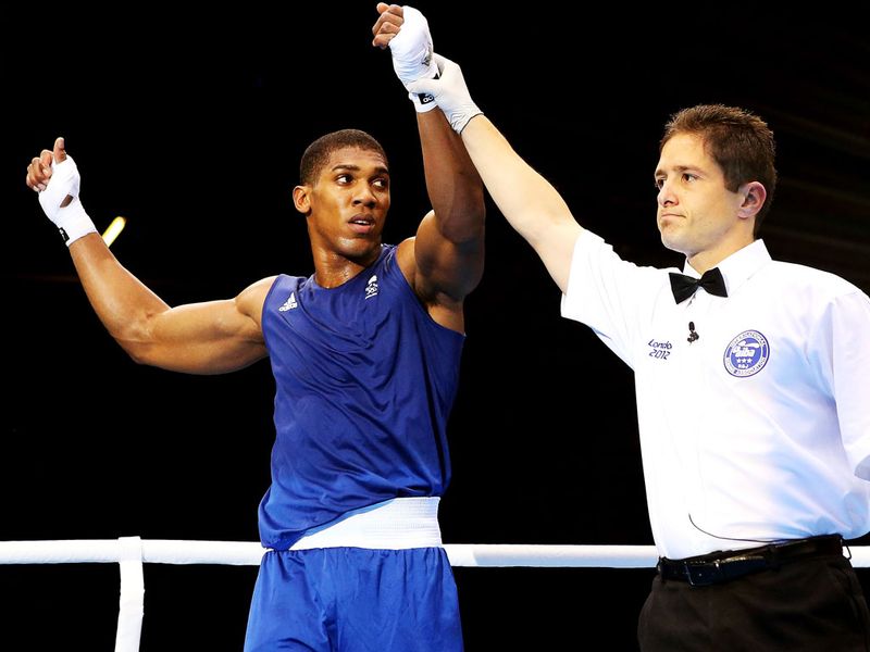 And Anthony Joshua joined him in the semi-finals after a 15-11 win over Zhilei Zhang.
