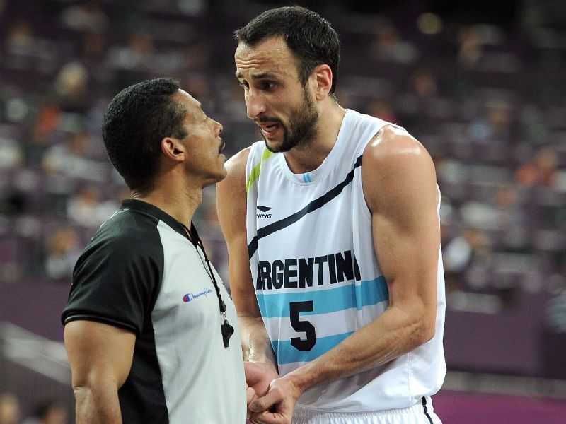 Come on Ref! Manu Ginobili of Argentina speaks with the referee during the men's basketball bronze medal game between Russia and Argentina