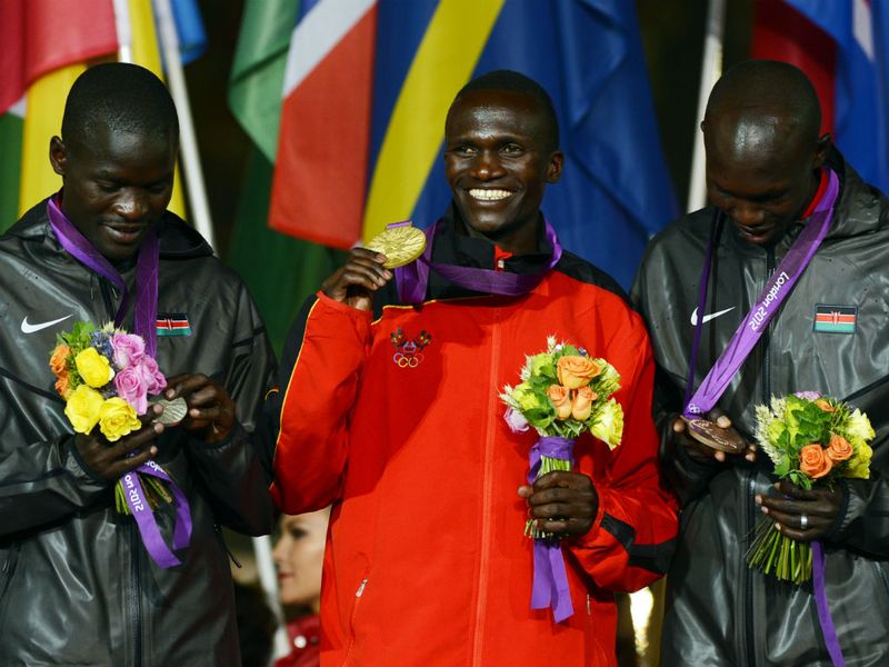 Uganda's Stephen Kiprotich receives his Gold Medal after winning the Men's Marathon earlier in the day