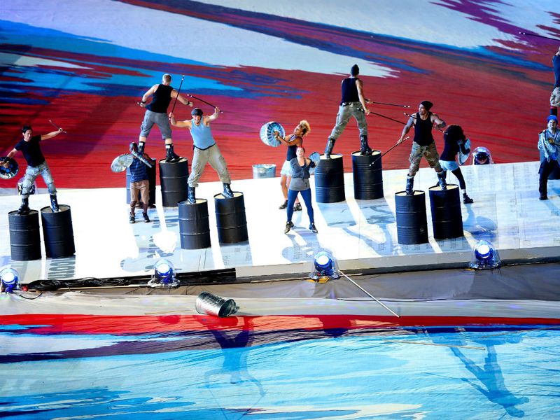 He is followed by Urban Percussionists from the cast of "Stomp" who recreate the daily clamour of London life