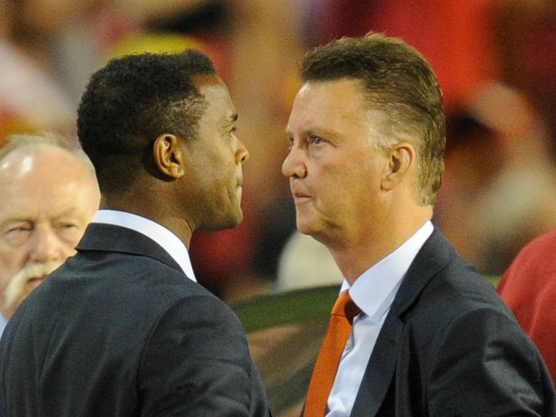 Holland head coach Louis van Gaal and his assistant Patrick Kluivert are stunned as the Oranje suffer a shock 4-2 defeat in Belgium.