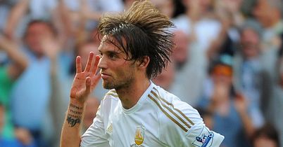 Michu: Fired Swansea to surprise triumph over Arsenal