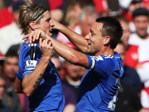 Fernando Torres celebrates with John Terry.