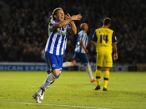 Craig Mackail-Smith celebrates his goal