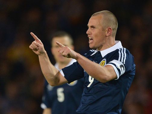 Kenny Miller: Not retiring from Scotland duty