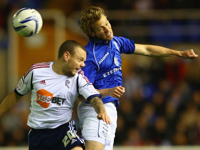 Jay Spearing and Jonathan Spector go for a high ball