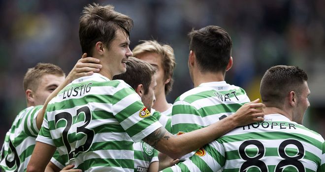 Lustig (l): Celebrates his opener for Celtic