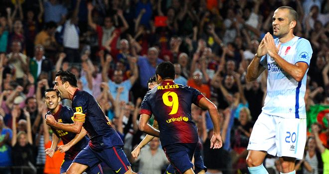 Xavi finally puts Barcelona ahead