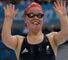 Ellie Simmonds celebrates victory in a world record time