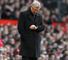 Sir Alex Ferguson: Manchester United manager checks his watch during the defeat by Tottenham