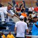 There was early controversy when Murray's hat flew off in the high winds