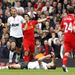 Jonny Evans comes off second best in a committed challenge with Jonjo Shelvey