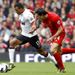 Nani tries to get away from Martin Kelly