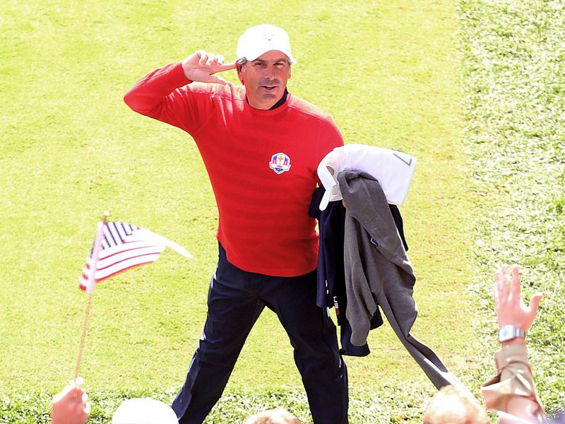 Fred Couples practices some crowd manipulation to get the gallery pumping.