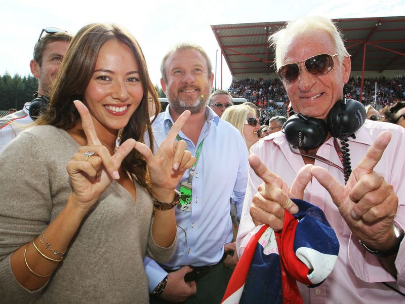Button's girlfriend Jessica Michibata and father John Button celebrate
