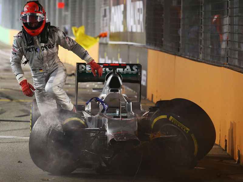 Michael climbs out of his broken Mercedes