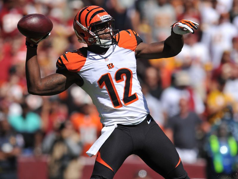 Mohamed Sanu threw a touchdown on a trick play as the Bengals beat the Redskins 38-31