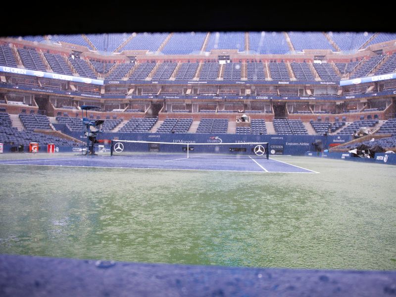 The rain hammered down early on day 13 of the 2012 US Open