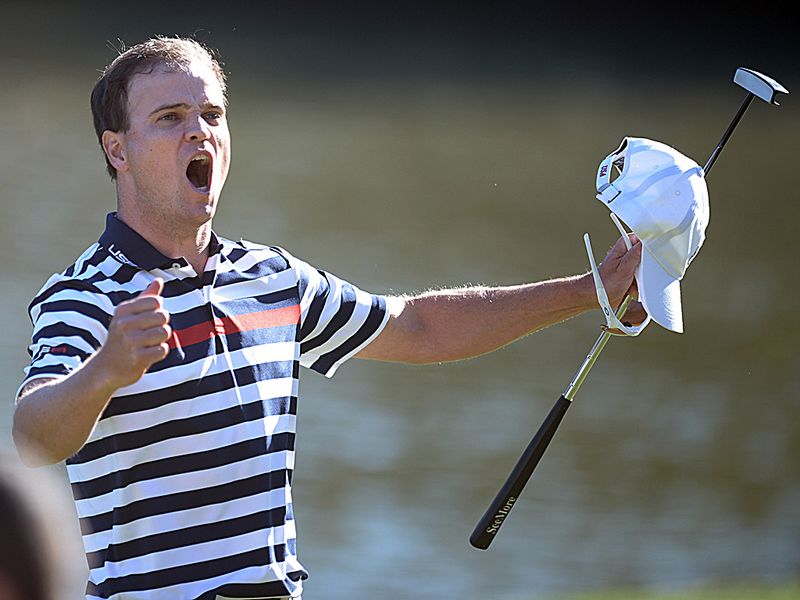 Zach Johnson completes a 2 and 1 victory over Graeme McDowell to add another red for USA.