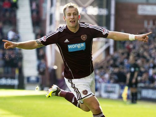 Danny Grainger celebrates his goal for Hearts