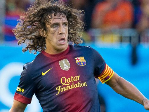 Carles Puyol: Extends Barcelona stay until 2016