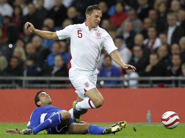 Phil Jagielka takes a tumble.