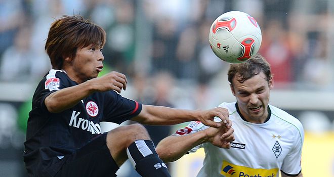 Takashi Inui clashes with Tony Jantschke