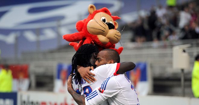 Bafetimbi Gomis celebrates his goal for Lyon