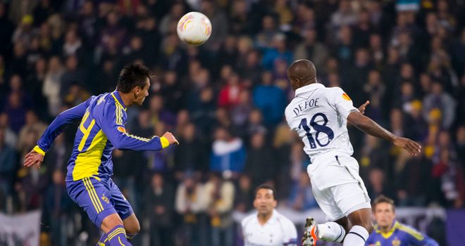 Heads up: Jermain Defoe and Soares Arghus vie for the ball
