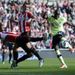 Demba Ba attempts to double the Magpies' lead but Carlos Cuellar stops him