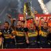 Kevin Sinfield lifts the Super League trophy once again