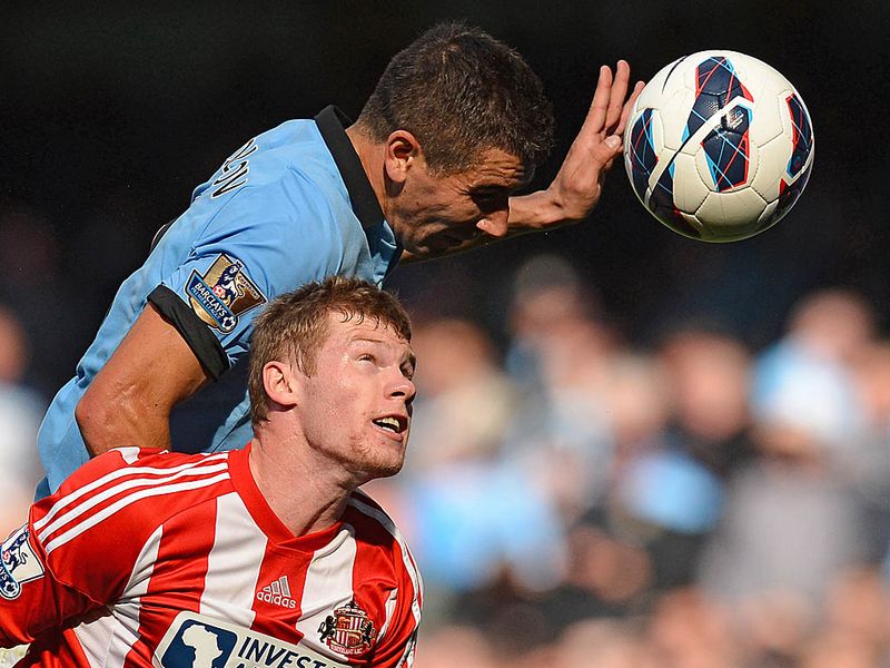 Aleksandar Kolarov picks up the Man of the Match award after being involved in the first two goals.