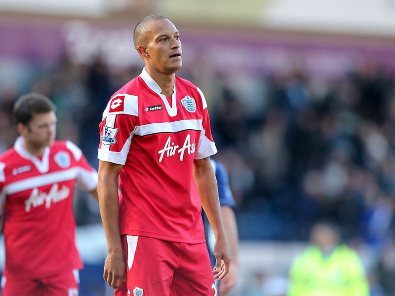Bobby Zamora looks dejected as Queens Park Rangers' defeat keeps them bottom of the league with just two points.