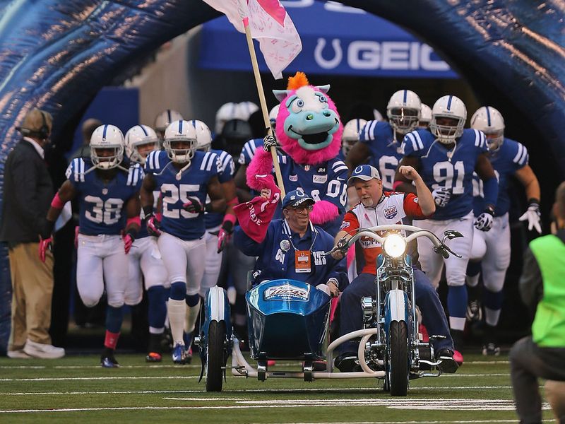 The Colts are led onto the field prior to their win against the Browns