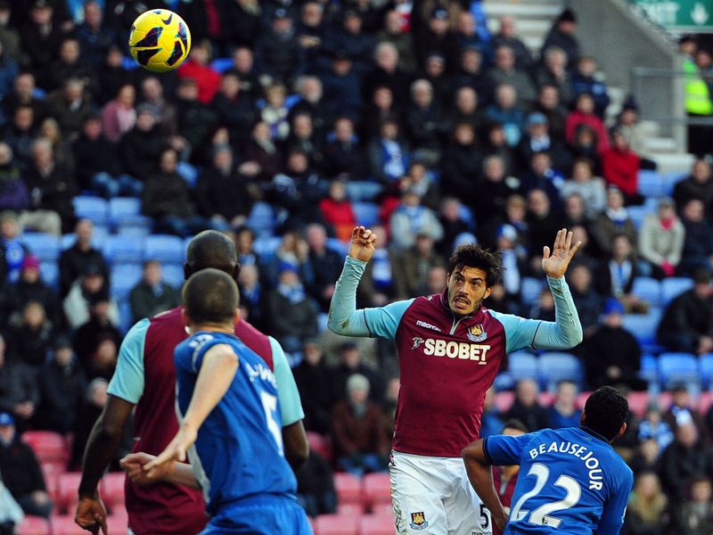 James Tomkins scored a late goal but it wasn't enough to stop Wigan claiming victory.