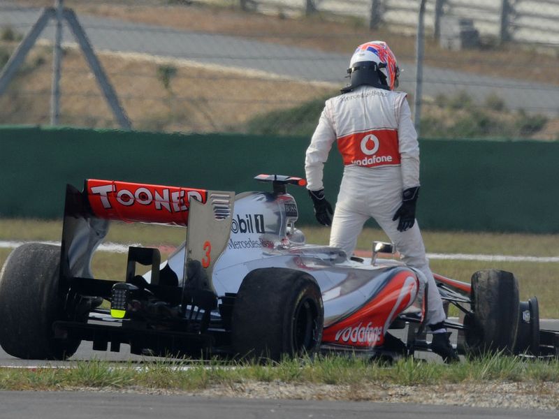 Jenson Button retires from the race having been unable to get the car back to the pits